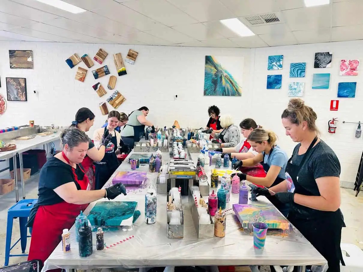 An acrylic pour class in full swing at the Balcatta studio