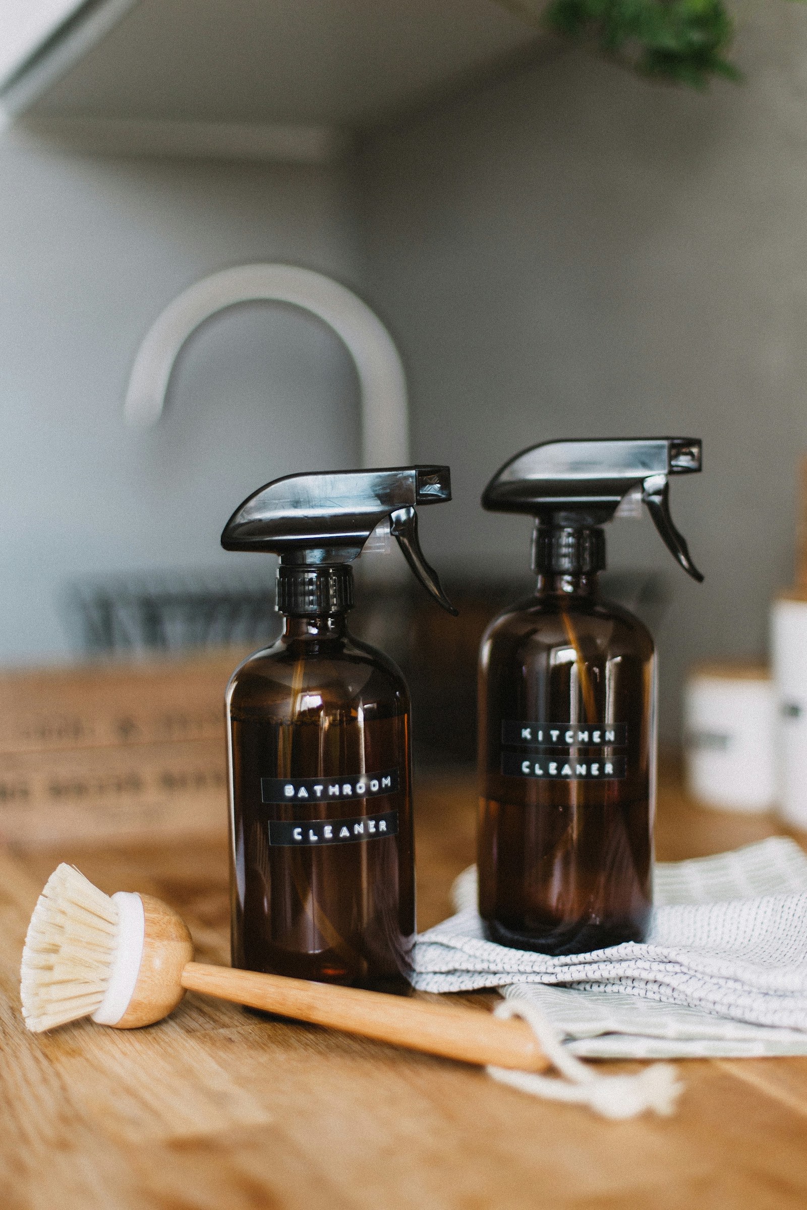 UNISOP bathroom and kitchen cleaners in amber glass